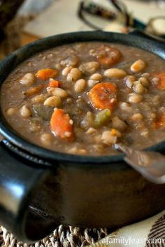 Slow Cooker Tuscan White Bean Soup - A simple, flavorful and hearty soup!