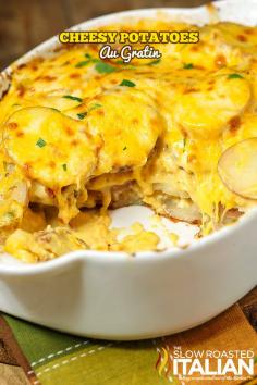 Thinly sliced potatoes layered among the creamiest cheese sauce ever come together to create this taste sensation.   Potatoes Au Gratin have been a long time favorite in our house.  And with this simple recipe they will be your go to side dish all year long!  #side #potato #recipe @SlowRoasted