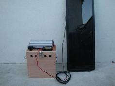 DIY Portable Solar Generator - Powers lights, a radio and recharge batteries.