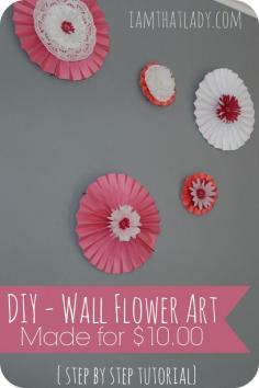 
                    
                        Are you looking for an inexpensive decorating idea for your walls? See how you can make these scrapbook wall flowers for under $10.00!
                    
                