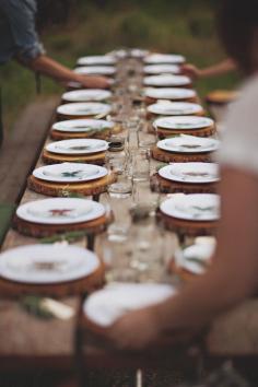 
                    
                        Rustic table inspiration. Wood chargers with simple white plates and clear drinkware.
                    
                