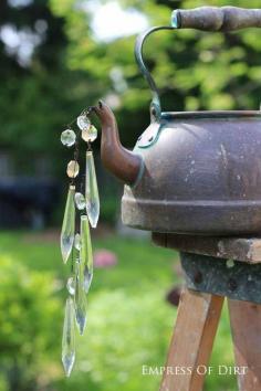 
                    
                        Gallery of watering can garden art ideas - old kettles can be used as well
                    
                
