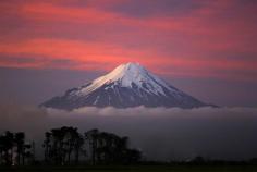 
                    
                        Fiery sunset over Mount Taranaki - truly is like no other! #snow
                    
                