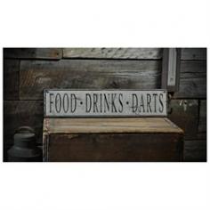 Distressed Food Drinks Darts Sign - Rustic Hand Made Vintage Wooden ENS1000679 27.5 x 120 Inches! Made from high-quality knotty pine. 100% USA Labor. Perfect gift for someone special on a special occasion. Most of our signs are designed to change a particular line or two of text so you can personalized it to you family name, business or your favorite destination, be it your home town, or the beach you travel to etc. If this sign needs any personalization please email me and let me know. Any significant changes in design will need to be quoted but text and colors can be changed. Also if you like this sign but need different colors please let me know and we will do our best to make it happen. Each sign is custom made for each individual customer's personal tastes. This is a one of a kind sign hand crafted in a small shop in Lizton, Indiana USA. We are offering this one of a kind item, so do not miss out on this great opportunity. If you have any questions please let me know. I have been making signs since 2003 and have sold to over 190 countries. Our signs are great for beach houses, cabins, lodges, rustic settings, barns, farms, homes, primitive decor, beach decor, den, office, basement, garage, hunting retreat, retail shop, restaurant, cottage, lake house, condo. well we can make you one for just about any location you can think of. Looking for a custom sign? Please contact us for a special concept just for you. We also offer a large variety of colors as well so if you would like this sign in another color combination please just let us know. The best way to do this is for you to browse through our signs that we have made and then let us know the colors you like on them. Colors may vary slightly from one computer screen to the next but the image should be very close.